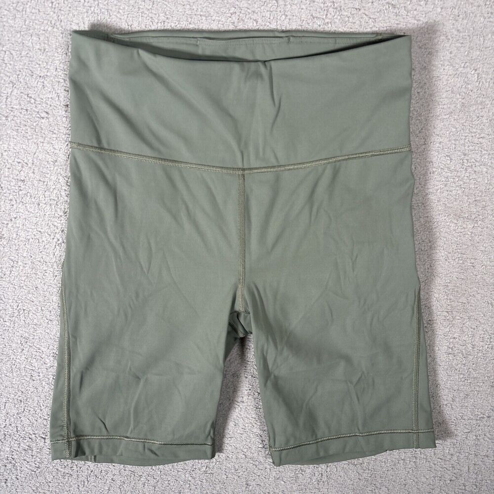Athleta Ultimate Stash Pocket 7 Inch Bike Short Olive Green Women’s Size XS